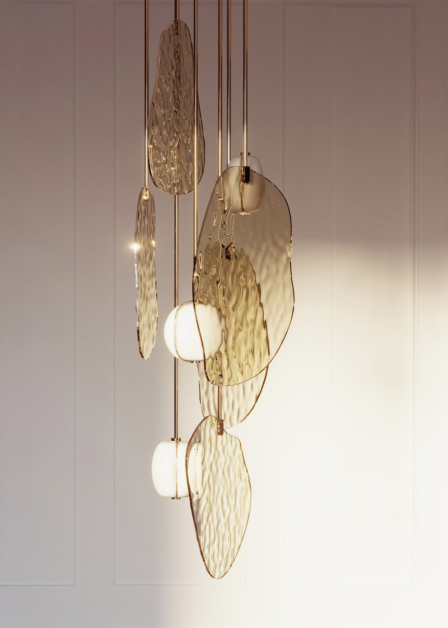 Rendu 3D d'une proposition de lustre en porcelaine, verre et laiton, réalisé dans le cadre d'un développement sur mesure.